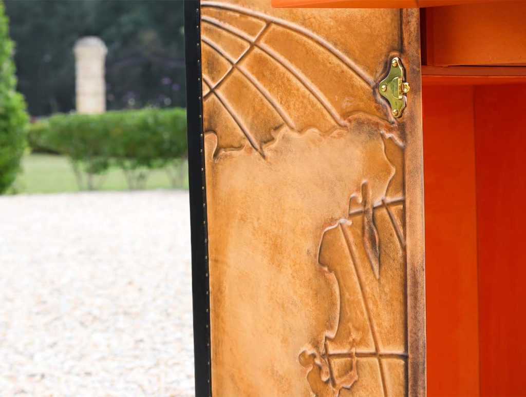 Studio flat bespoke trunk with bed wardrobe brown gold leather handcrafted gold fitting with world maps