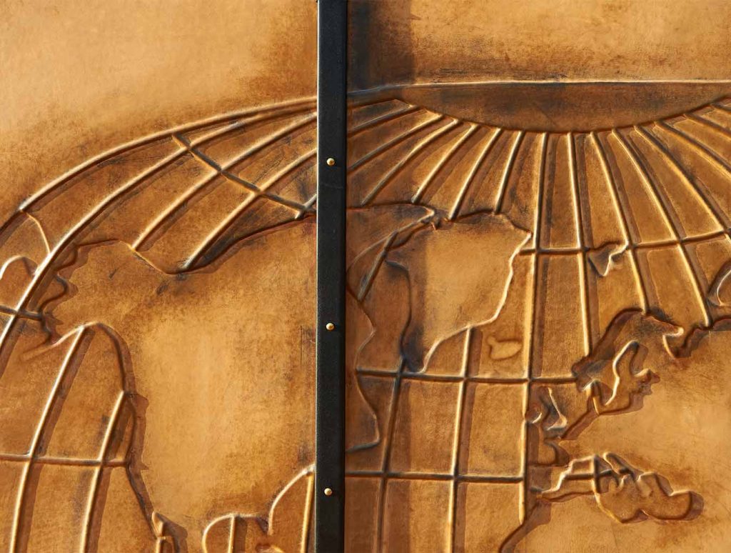 Studio flat bespoke trunk with bed wardrobe brown gold leather handcrafted world maps